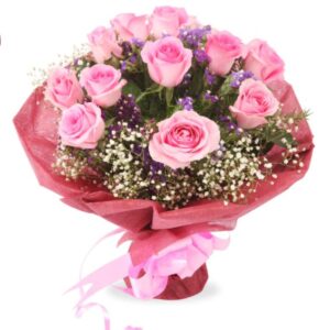 A dozen pink roses beautifully packed