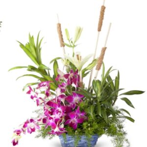 Arrangement of orchids and lilies